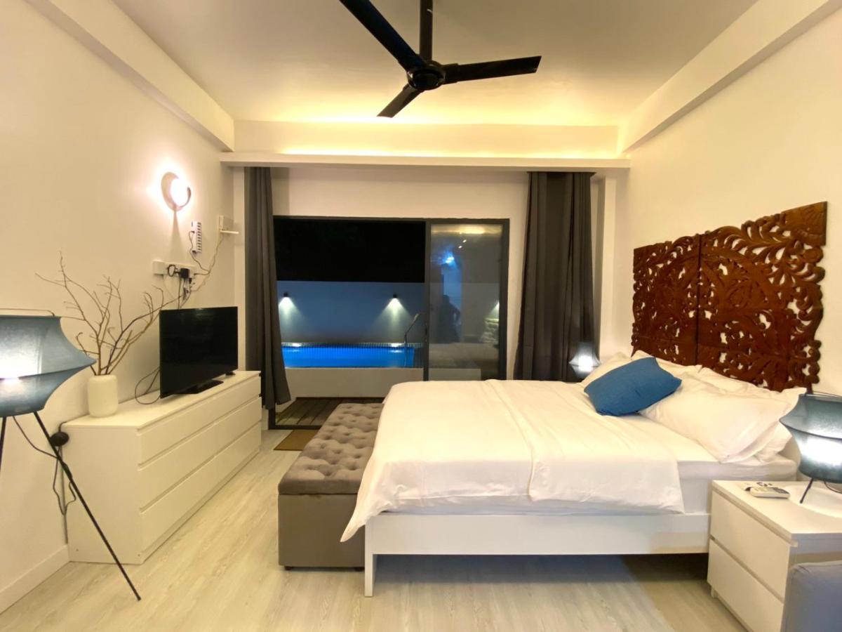 Отель Unwind Dhigurah Дигура Экстерьер фото