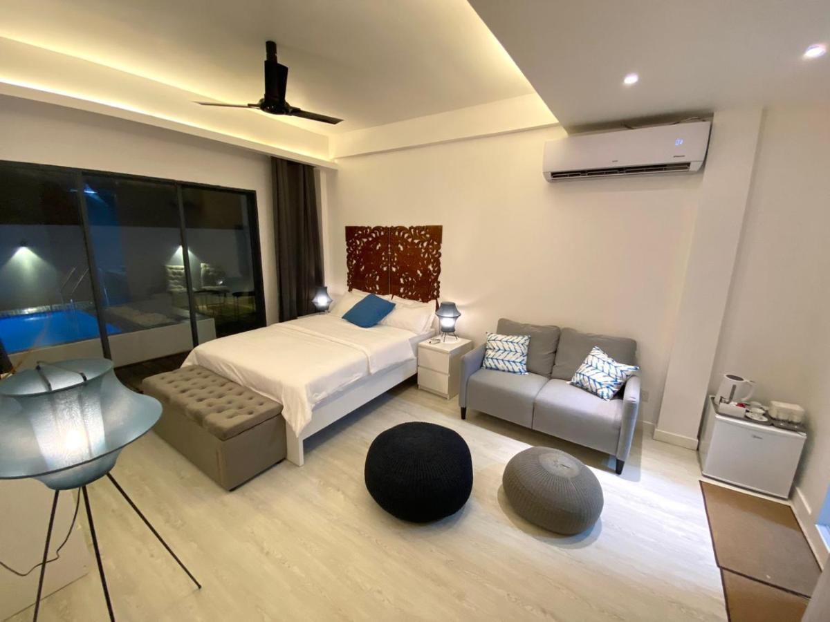 Отель Unwind Dhigurah Дигура Экстерьер фото