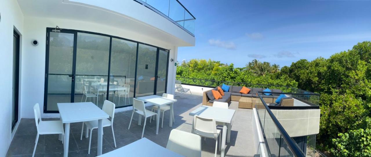 Отель Unwind Dhigurah Дигура Экстерьер фото