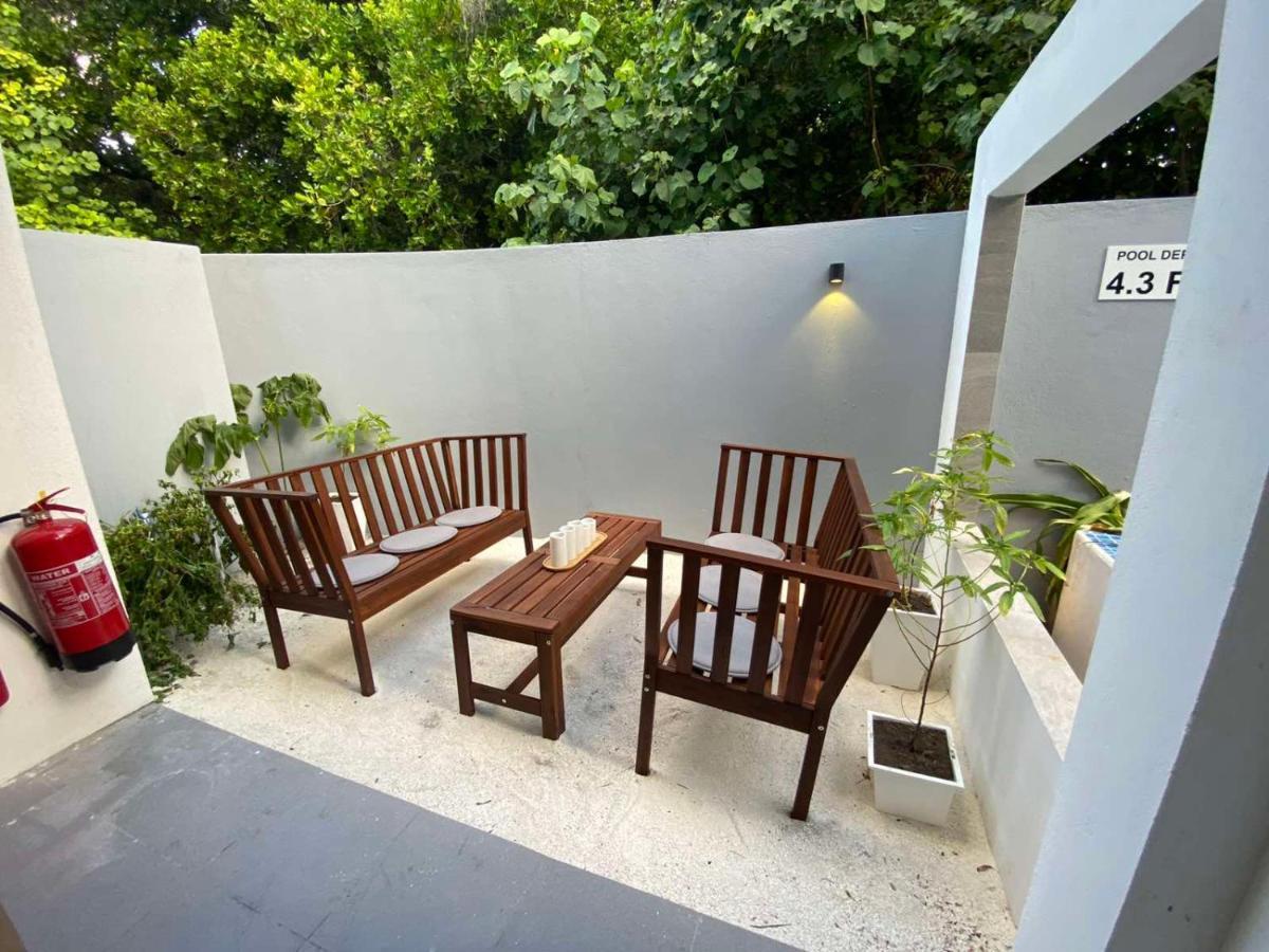 Отель Unwind Dhigurah Дигура Экстерьер фото