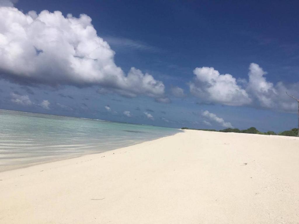 Отель Unwind Dhigurah Дигура Экстерьер фото