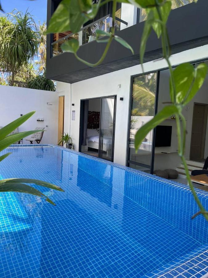 Отель Unwind Dhigurah Дигура Экстерьер фото