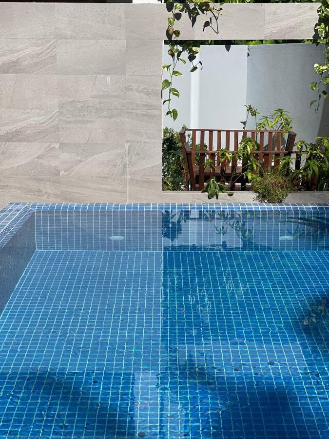 Отель Unwind Dhigurah Дигура Экстерьер фото