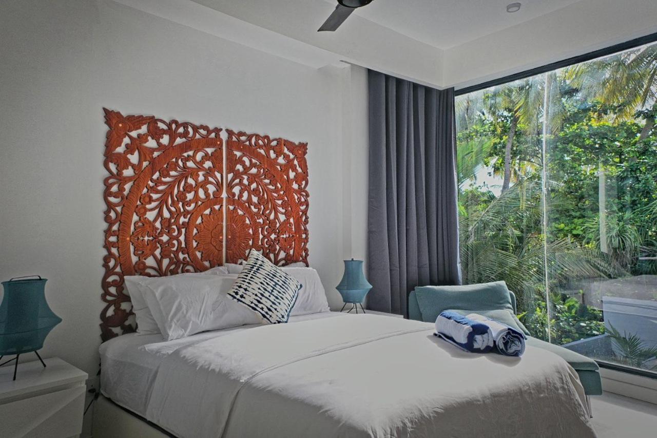 Отель Unwind Dhigurah Дигура Экстерьер фото